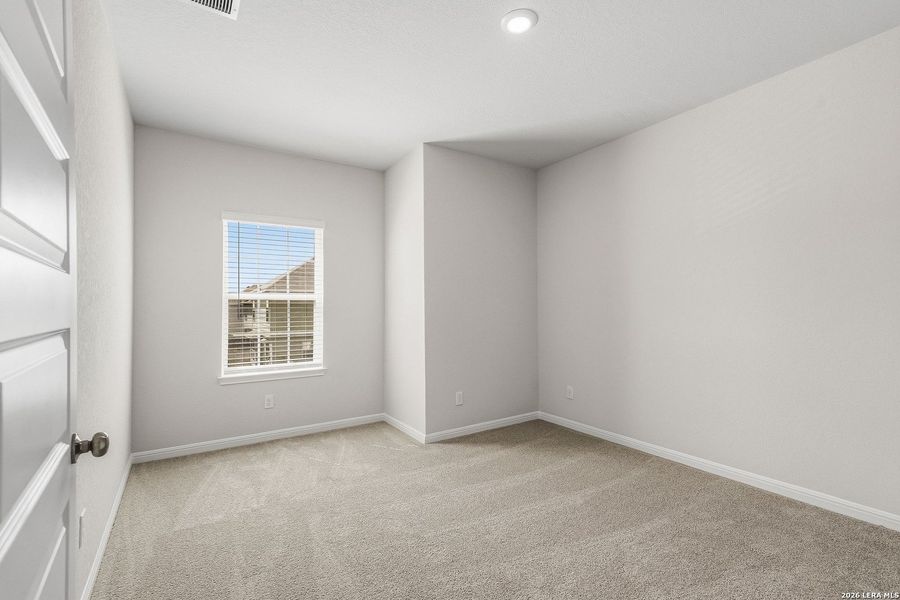 Spacious, unfurnished interior of a new home in Melissa Ranch, San Antonio (Image 18).