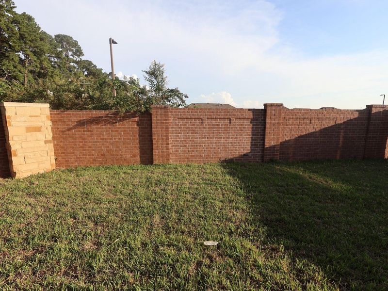 Front exterior of a new home in Lone Star Landing, Montgomery, TX, highlighting curb appeal (Image 14). Front exterior of a new home in Lone Star Landing, Montgomery, TX, highlighting curb appeal (Image 14).