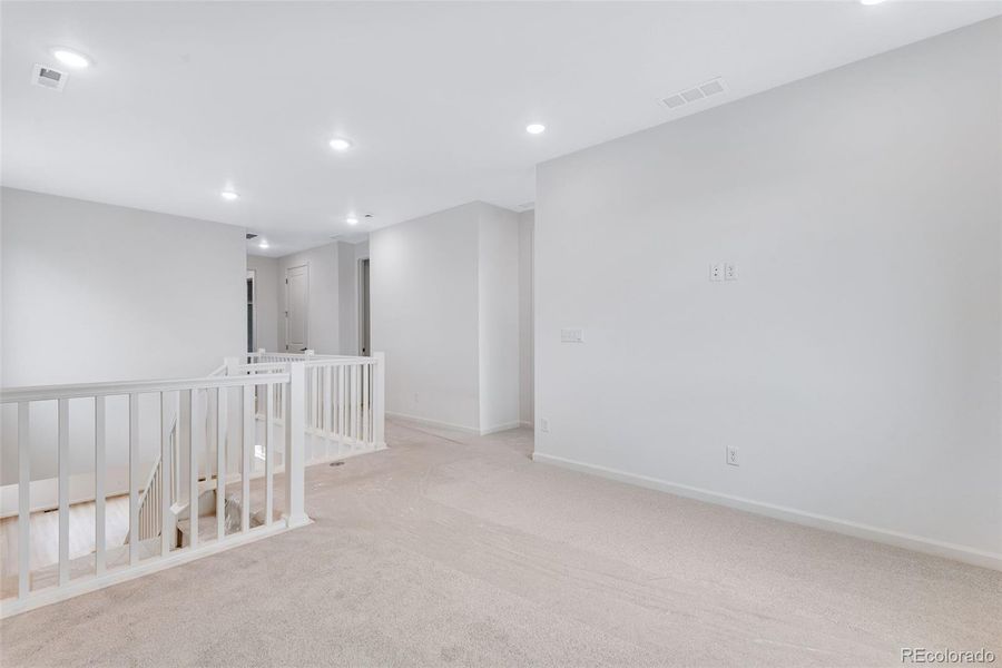 Spacious, unfurnished interior of a new home in Reunion, Commerce City (Image 32).