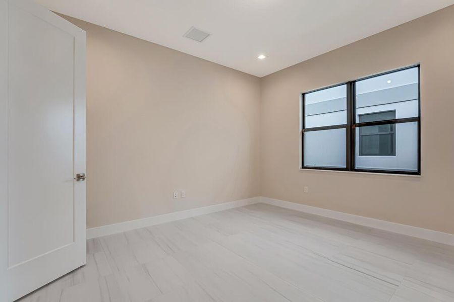 Furnished interior view inside a new home in Apex at Avenir, Palm Beach Gardens (Image 17). Furnished interior view inside a new home in Apex at Avenir, Palm Beach Gardens (Image 17).