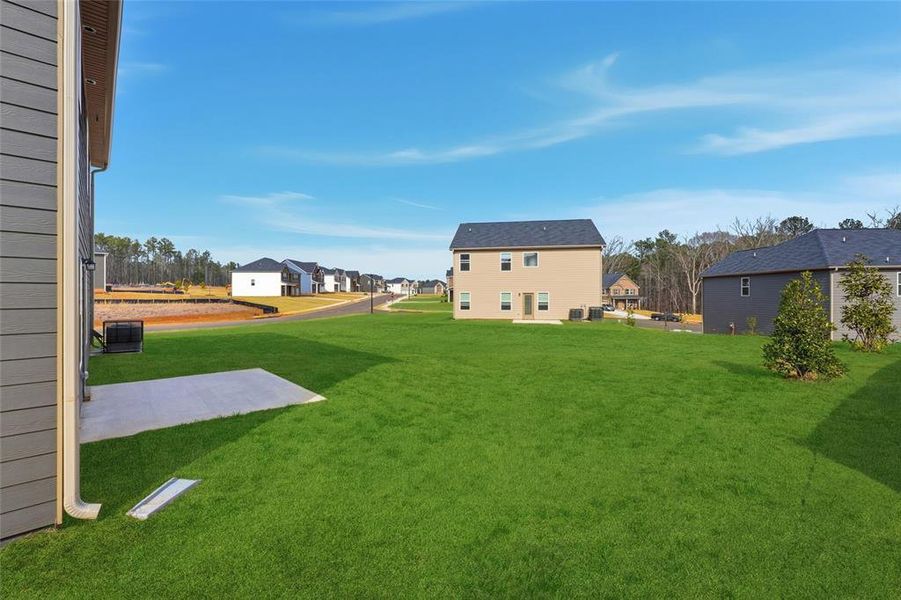 Exterior details and patio area of a home in Fern Dale, Fairburn (Image 20).