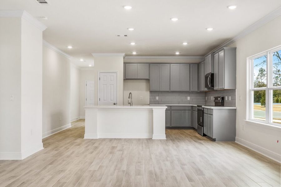 Furnished interior view inside a new home in Natureview, Freeport (Image 13).