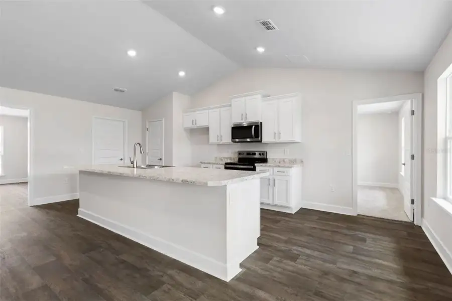 Representative furnished interior of a home built from the 2117 by Adams Homes in Flagler Estates, Hastings (Image 4).