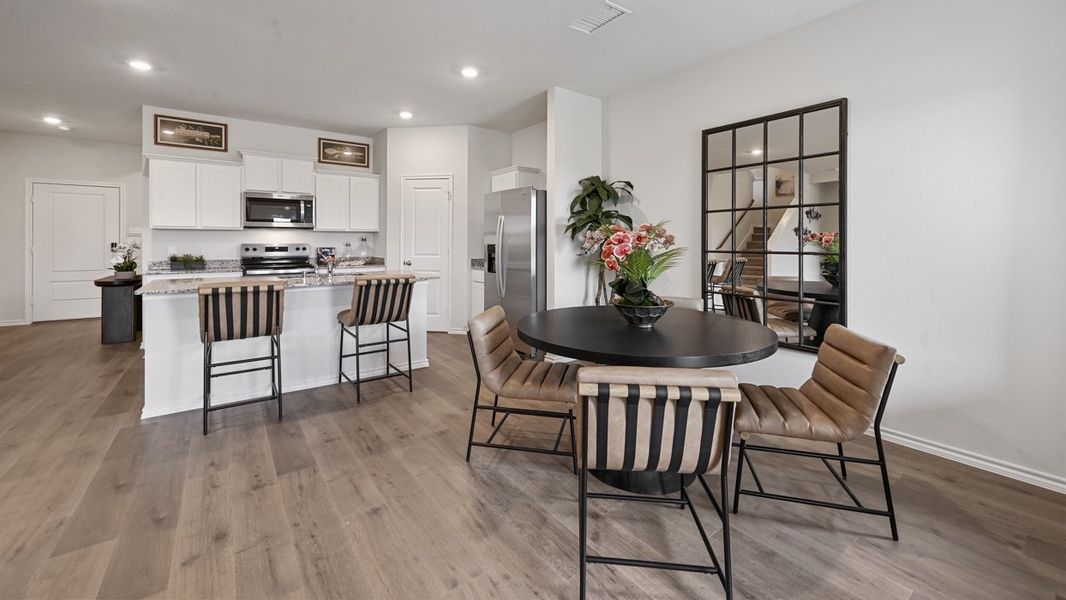 Representative furnished interior of a home built from the Midland by D.R. Horton in Frontier Pointe, Princeton (Image 8).