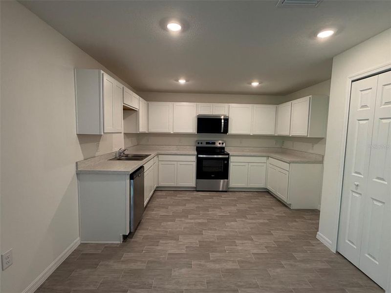 Furnished interior view inside a new home in Poinciana - Polk County, Poinciana (Image 5). Furnished interior view inside a new home in Poinciana - Polk County, Poinciana (Image 5).