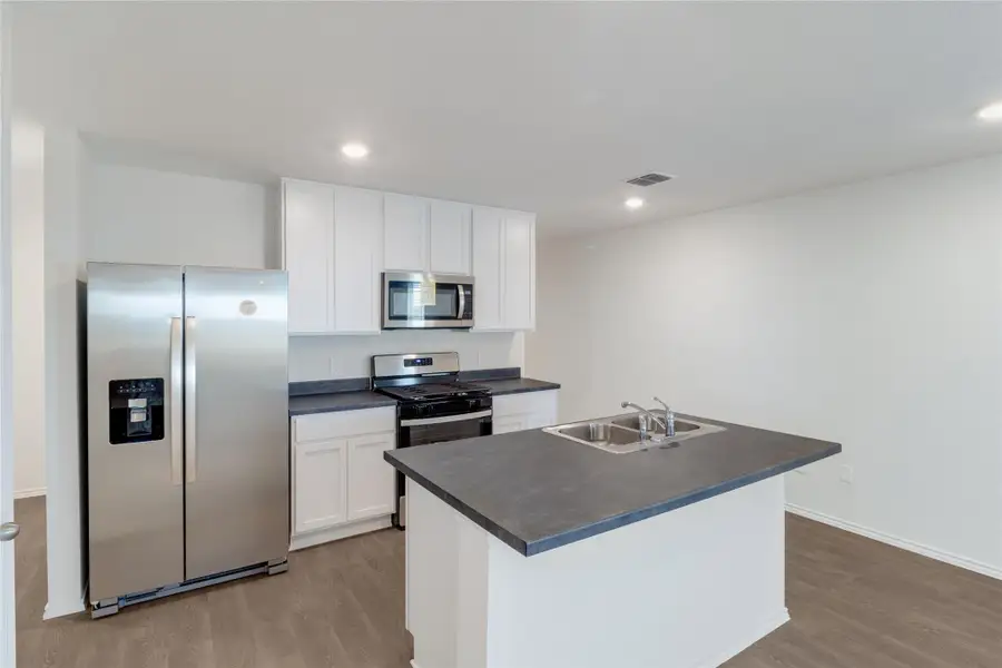 Furnished interior view inside a new home in Prairie Lakes, Buda (Image 4). Furnished interior view inside a new home in Prairie Lakes, Buda (Image 4).