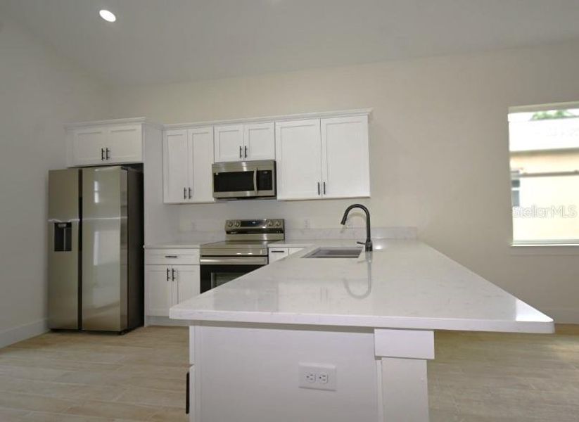 Furnished interior view inside a new home in , Dade City (Image 4).