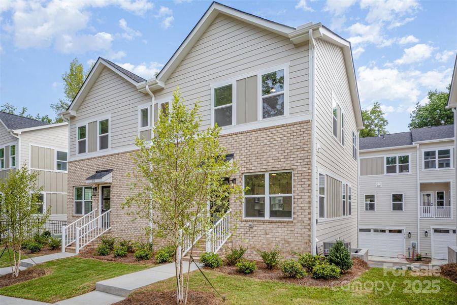 Front exterior of a new home in , Charlotte, NC, highlighting curb appeal (Image 22).