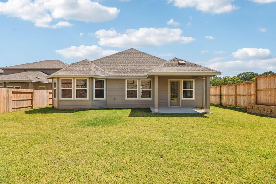 Exterior details and patio area of a home in Pine Lake Cove - Classic Series, Montgomery (Image 2). Exterior details and patio area of a home in Pine Lake Cove - Classic Series, Montgomery (Image 2).