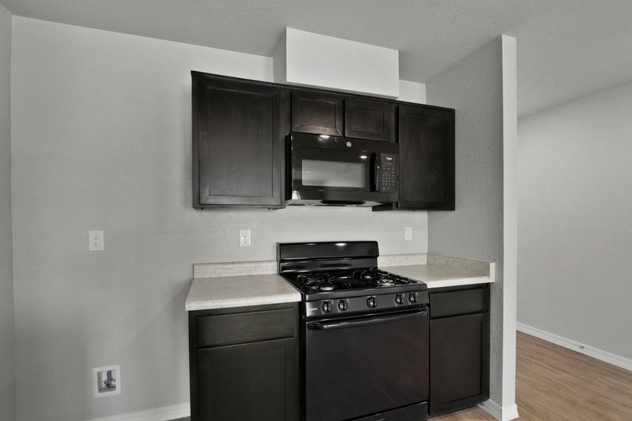 Furnished interior view inside a new home in Rancho Desierto Bello, Horizon City (Image 13).