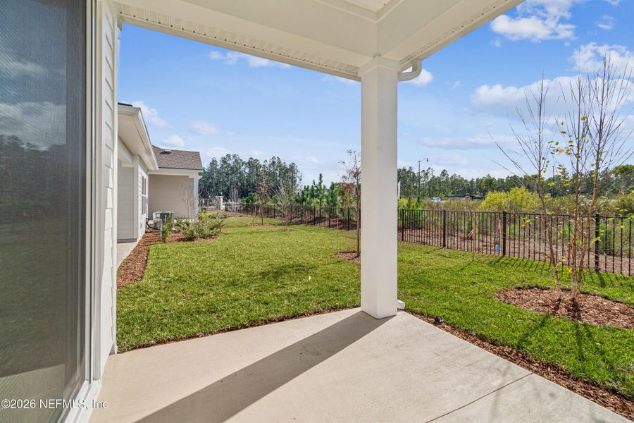 Exterior details and patio area of a home in Evergreen Island at Silverleaf - Executive, St. Augustine (Image 3).