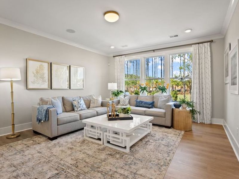 Representative furnished interior of a home built from the Jasper P by True Homes in Homecoming, Ravenel (Image 6).