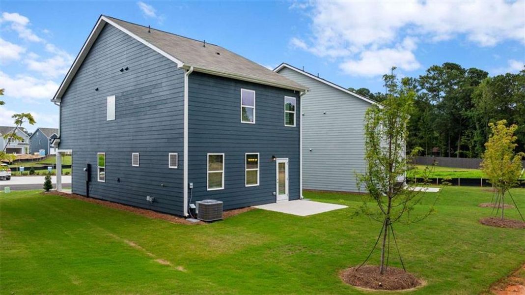 Exterior details and patio area of a home in Walden Park - The Retreat, Jonesboro (Image 3).