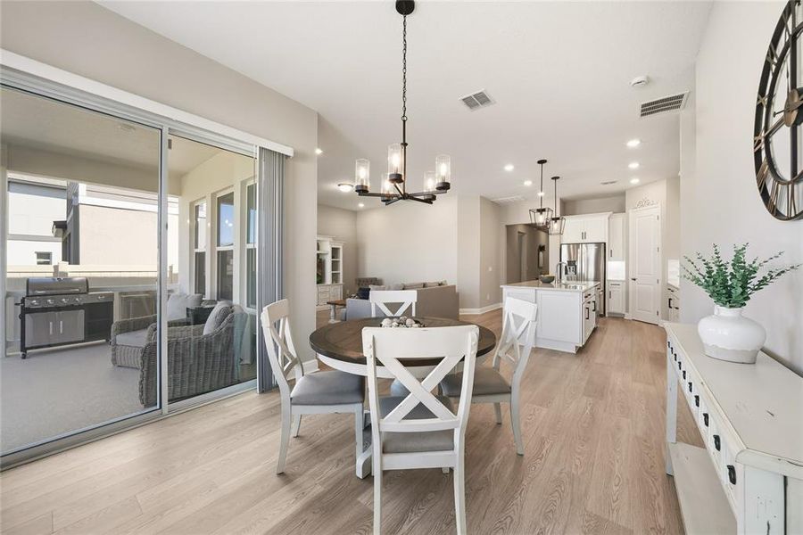 Furnished interior view inside a new home in Silverleaf Reserve, Winter Garden (Image 31).