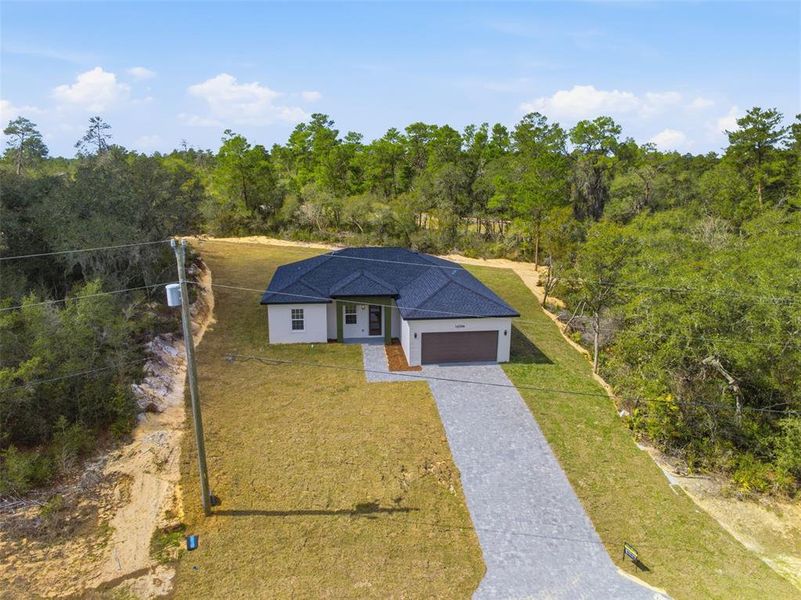 Front exterior of a new home in , Ocala, FL, highlighting curb appeal (Image 20).