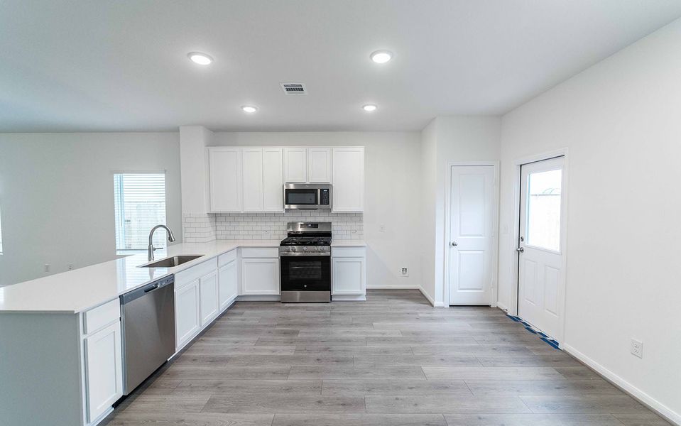 Furnished interior view inside a new home in Briarwood, Elgin (Image 4).
