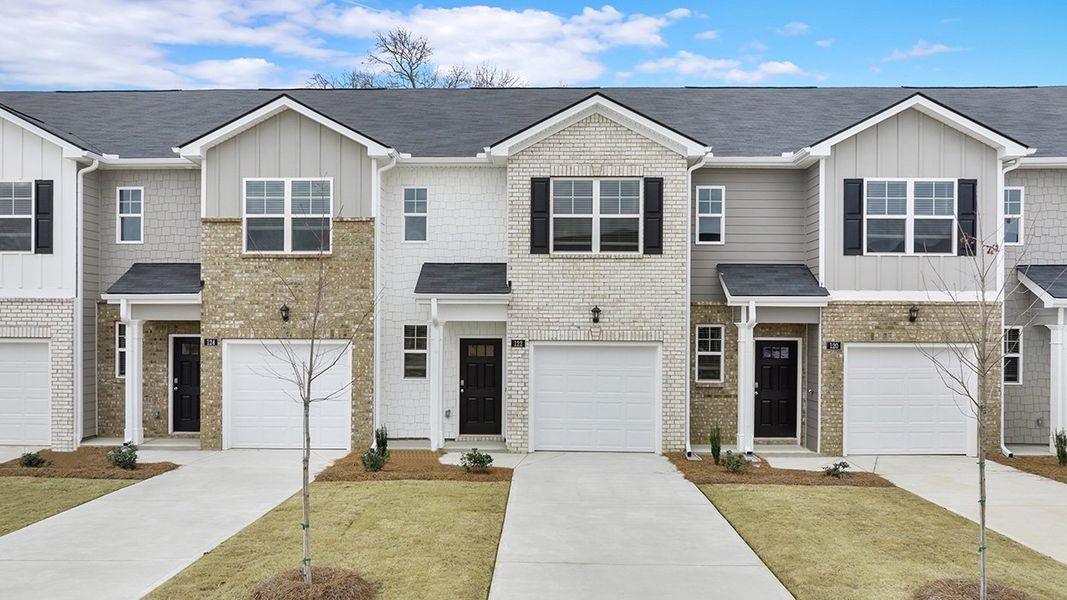 Front exterior of a new home in The Gables at Agricultural Village, Perry, GA, highlighting curb appeal (Image 1). Front exterior of a new home in The Gables at Agricultural Village, Perry, GA, highlighting curb appeal (Image 1).