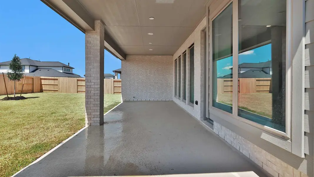 Exterior details and patio area of a home in Legacy Prairie at Katy Court, Katy (Image 3).