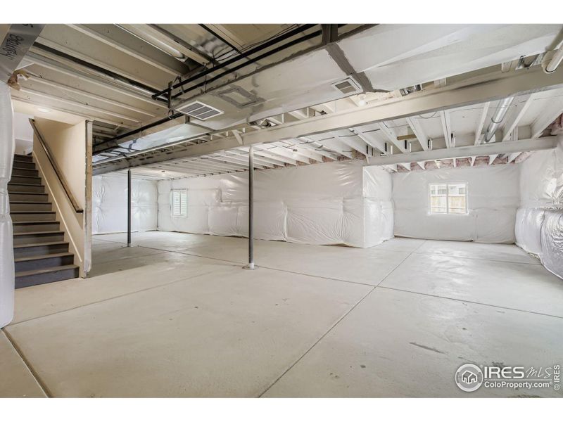 In-progress construction of a new home in RainDance National 60/70, Windsor, CO (Image 26).