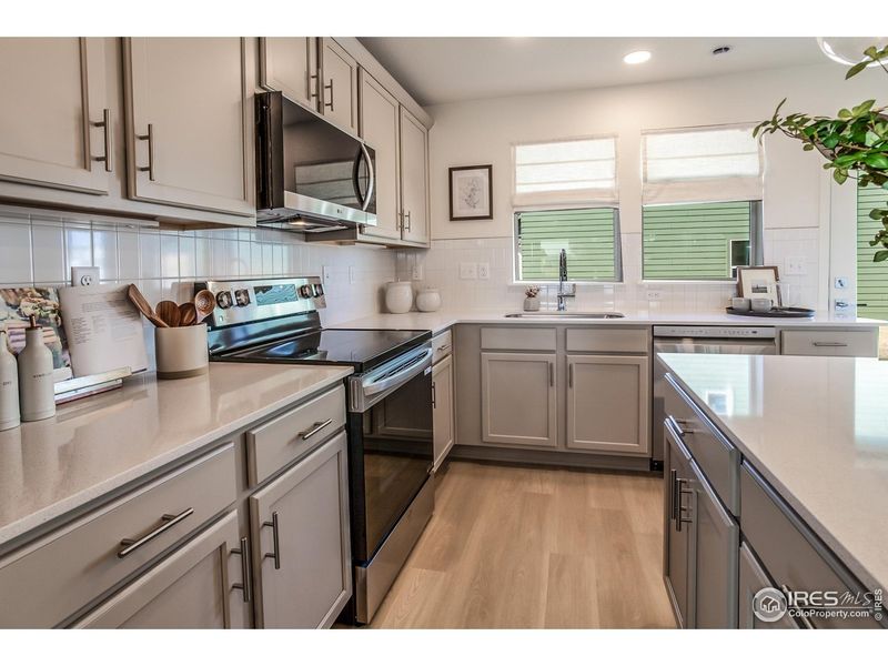 Furnished interior view inside a new home in Prairie Song Cottages, Windsor (Image 28).