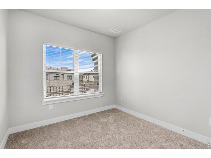 Spacious, unfurnished interior of a new home in Highlands at Fox Hill - The Flats, Longmont (Image 14).