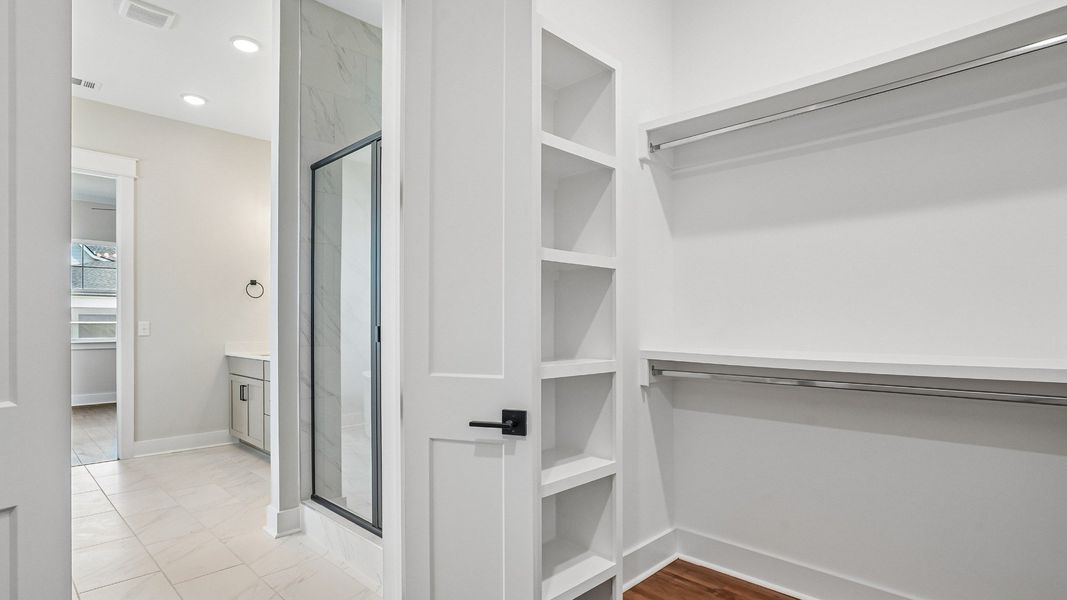 Spacious Walk-In Closet with Upgraded Built-In Shelving Standard!