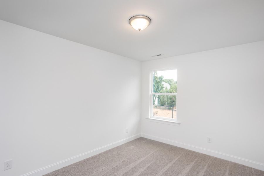 Spacious, unfurnished interior of a new home in Enclave at Traditions Townhomes, Wake Forest (Image 15).