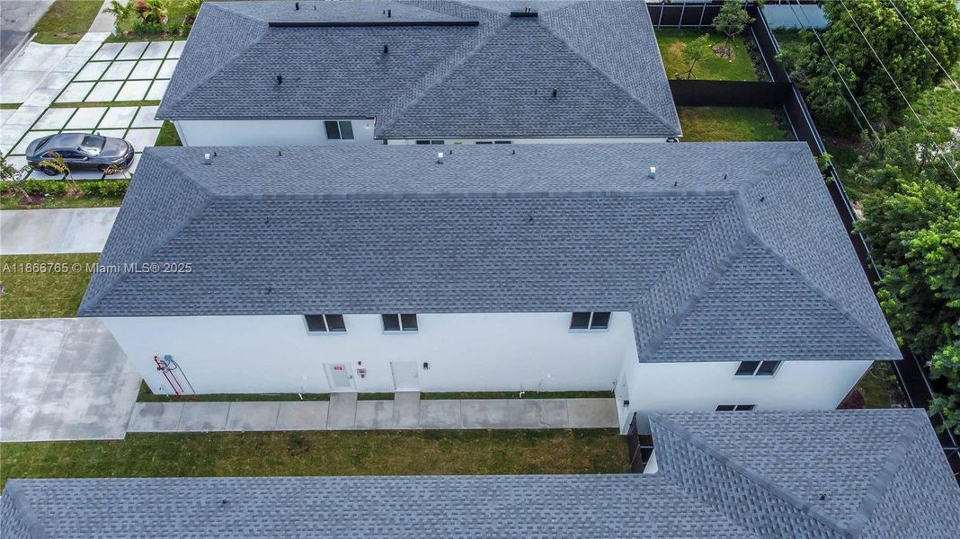 Front exterior of a new home in , Miami, FL, highlighting curb appeal (Image 17).