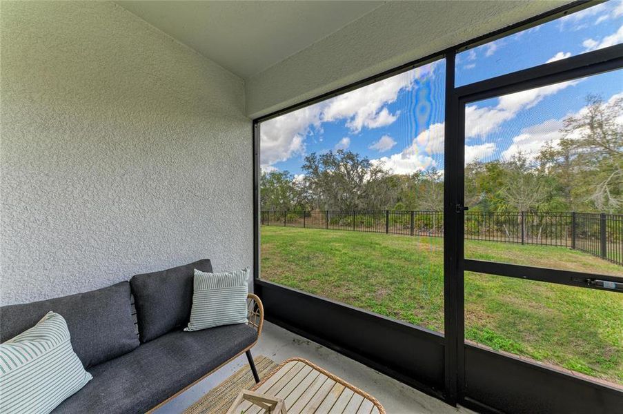 Exterior details and patio area of a home in Rye Crossing, Parrish (Image 4).