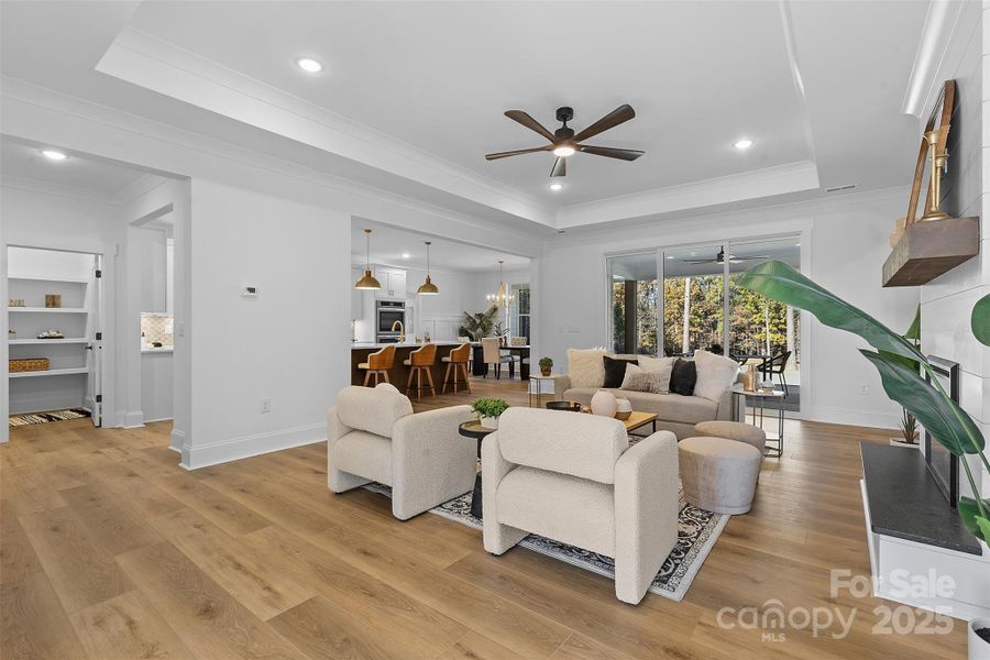 *representative photo- family room w/ tray ceiling, shiplap fireplace & cedar mantle!