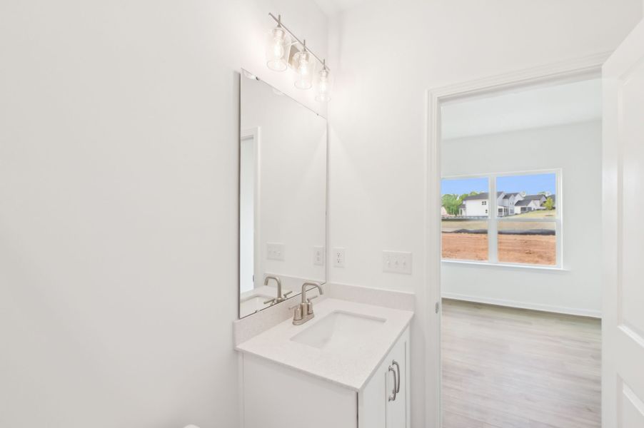Representative furnished interior of a home built from the Alexis by Ashton Woods in Rowland's Grant, Fuquay Varina (Image 12).