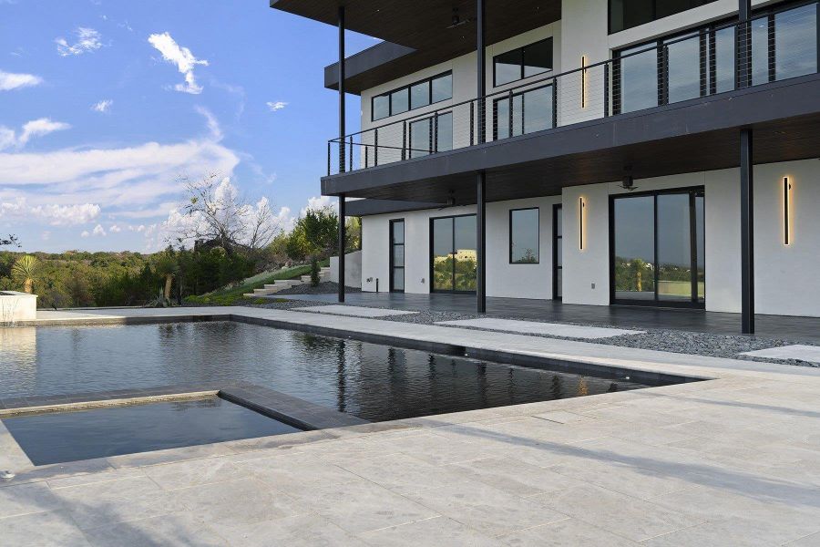 Front exterior of a new home in , Spicewood, TX, highlighting curb appeal (Image 23).