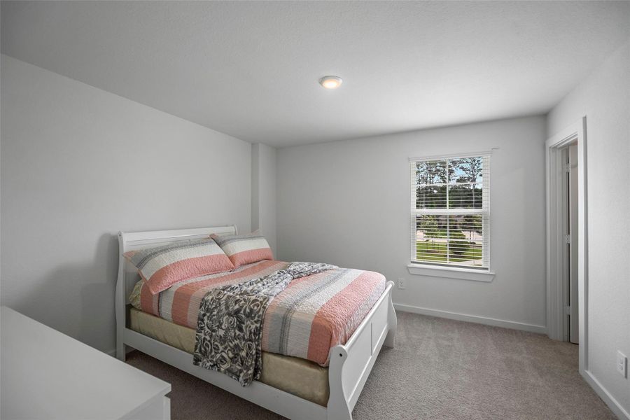 Furnished interior view inside a new home in Sorella, Tomball (Image 18).