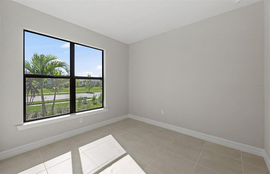 Spacious, unfurnished interior of a new home in Cedar Grove at The Woodlands, North Port (Image 15).