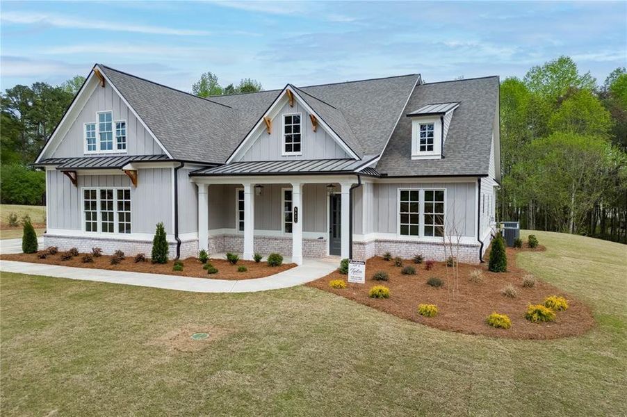 Front exterior of a new home in , Cumming, GA, highlighting curb appeal (Image 25).