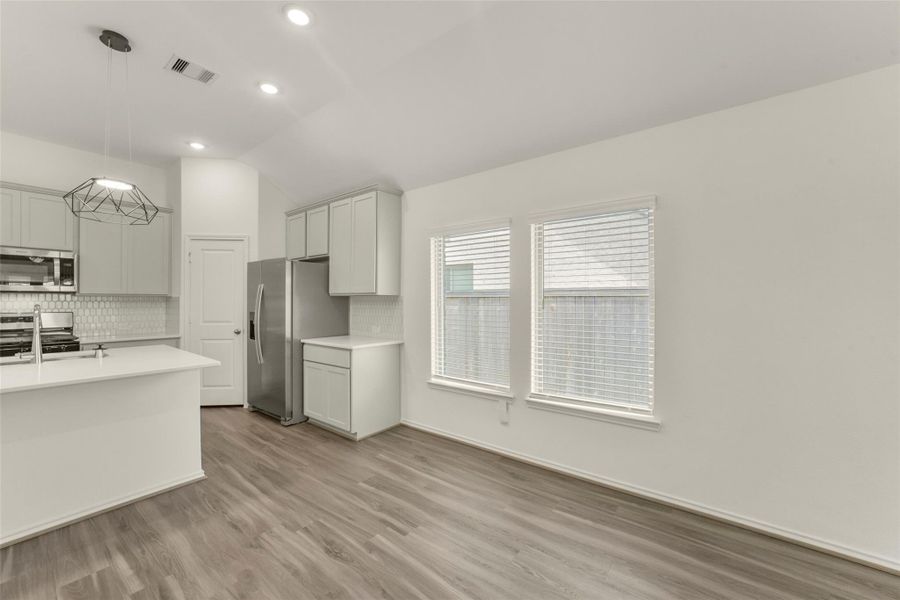 Furnished interior view inside a new home in Bridgeland, Cypress (Image 14).