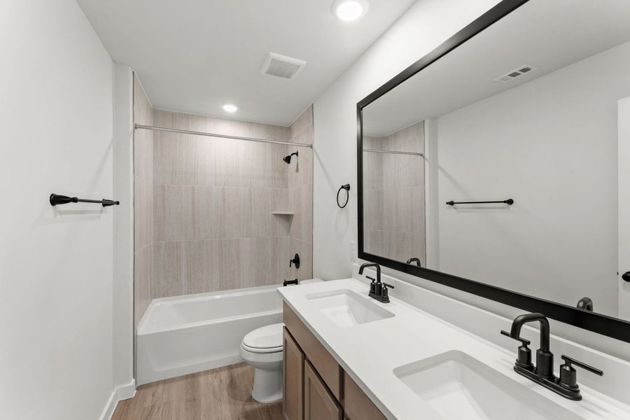 Furnished interior view inside a new home in Veranda Designer, San Antonio (Image 14).