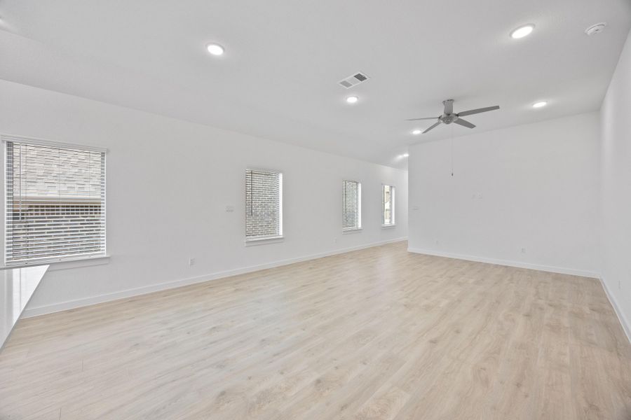 Living Room in the Pecan II home plan by Trophy Signature Homes – REPRESENTATIVE PHOTO