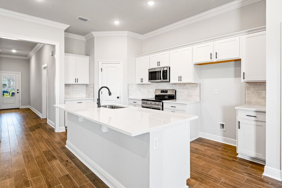 Furnished interior view inside a new home in Sentinel Ridge, Pace (Image 6).