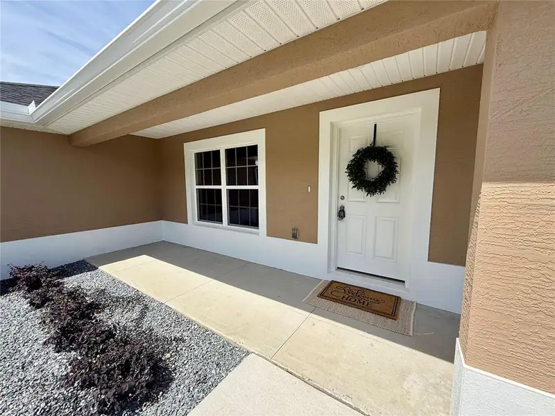 Exterior details and patio area of a home in , Ocala (Image 3).