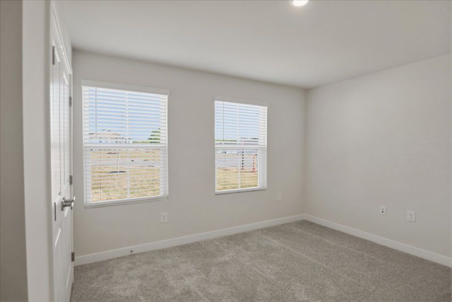 Spacious, unfurnished interior of a new home in Reidville Town Center Cottages, Duncan (Image 11).