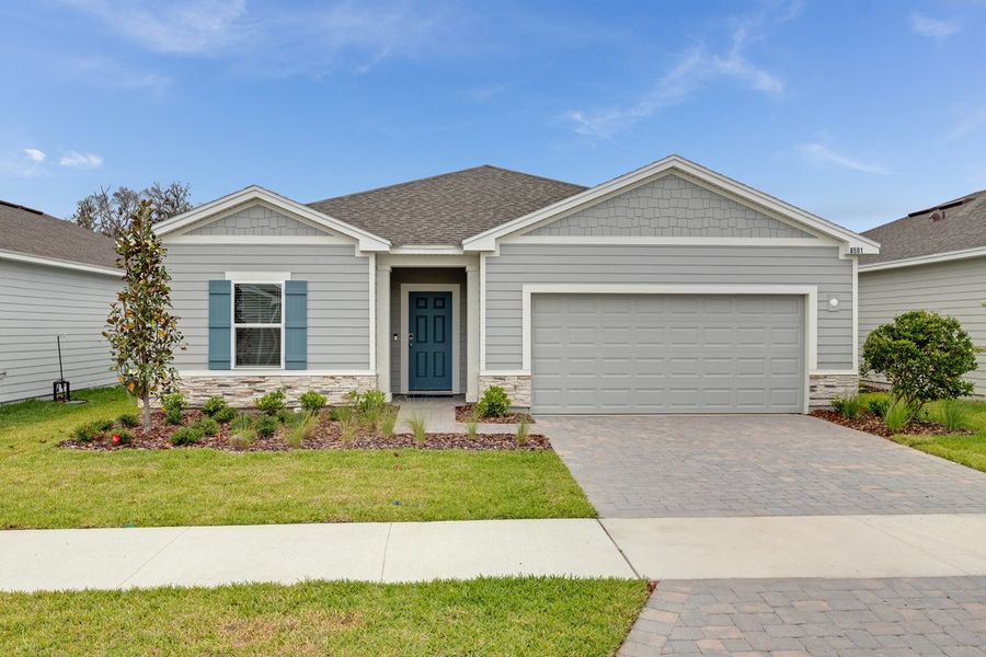 Representative exterior photo of a completed home built from the Ficus by Taylor Morrison in Coopers Meadow, Jacksonville, FL (Image 1).