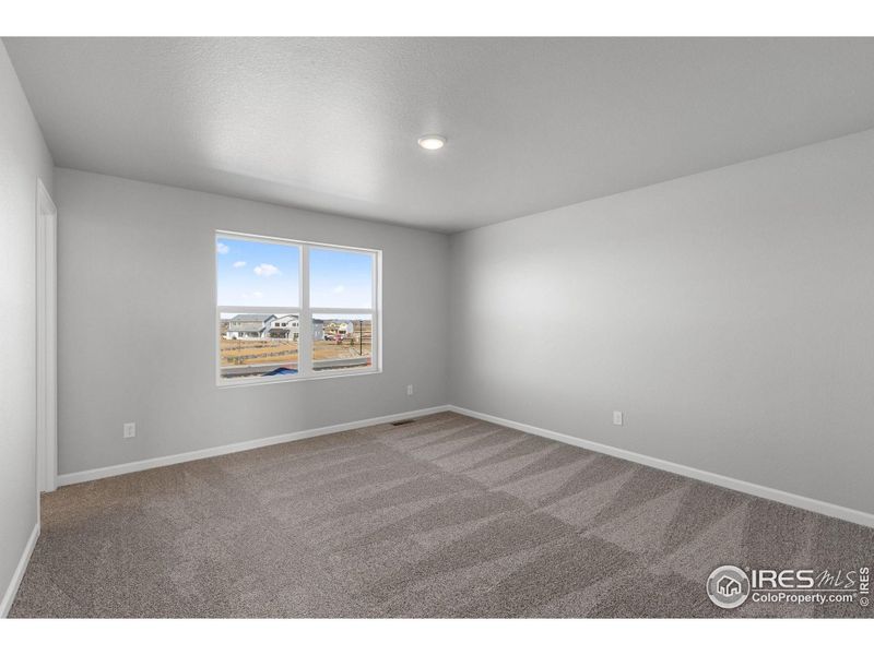 Spacious, unfurnished interior of a new home in Cordovan, Longmont (Image 13).
