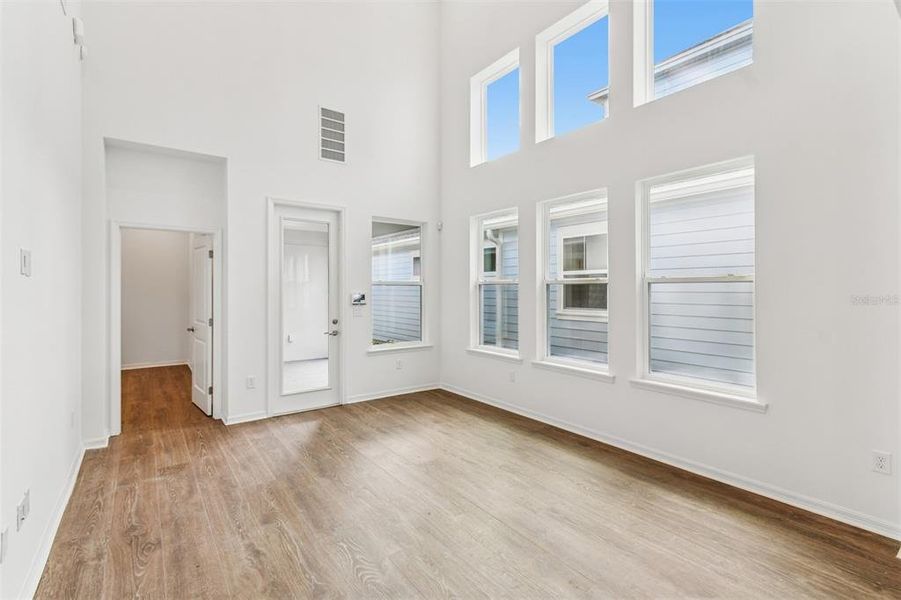 Spacious, unfurnished interior of a new home in Laureate Park at Lake Nona - Garden Series, Orlando (Image 38).