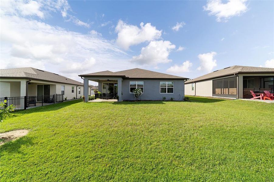 Exterior details and patio area of a home in Del Webb Stone Creek, Ocala (Image 23).