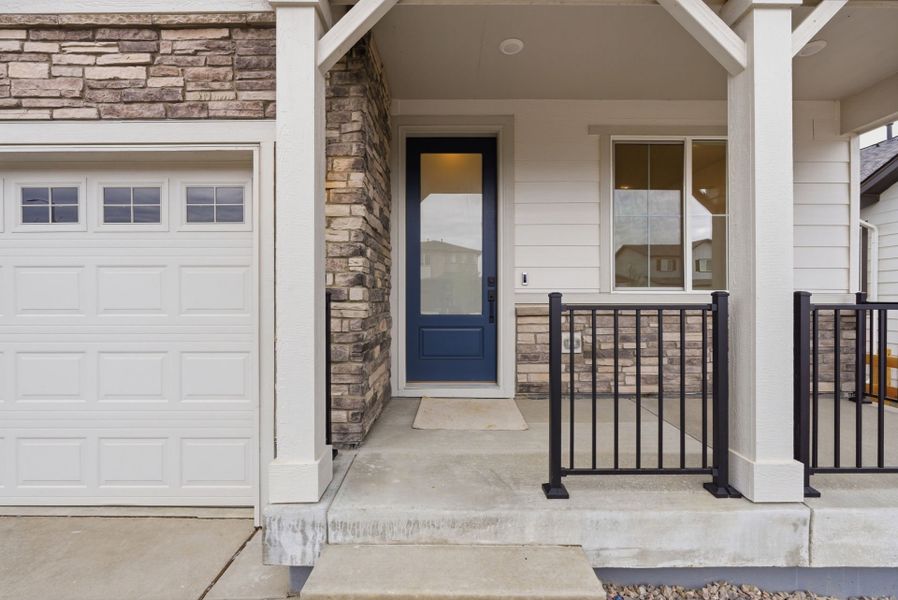 Exterior details and patio area of a home in Harvest Crossing, Aurora (Image 3).