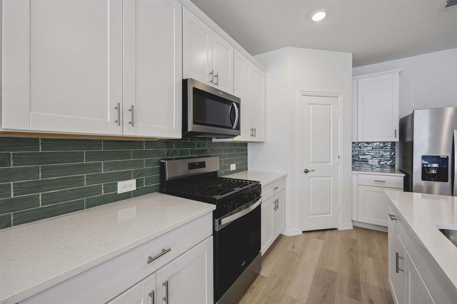 Furnished interior view inside a new home in Lakehaven - Signature Series, Farmersville (Image 14).