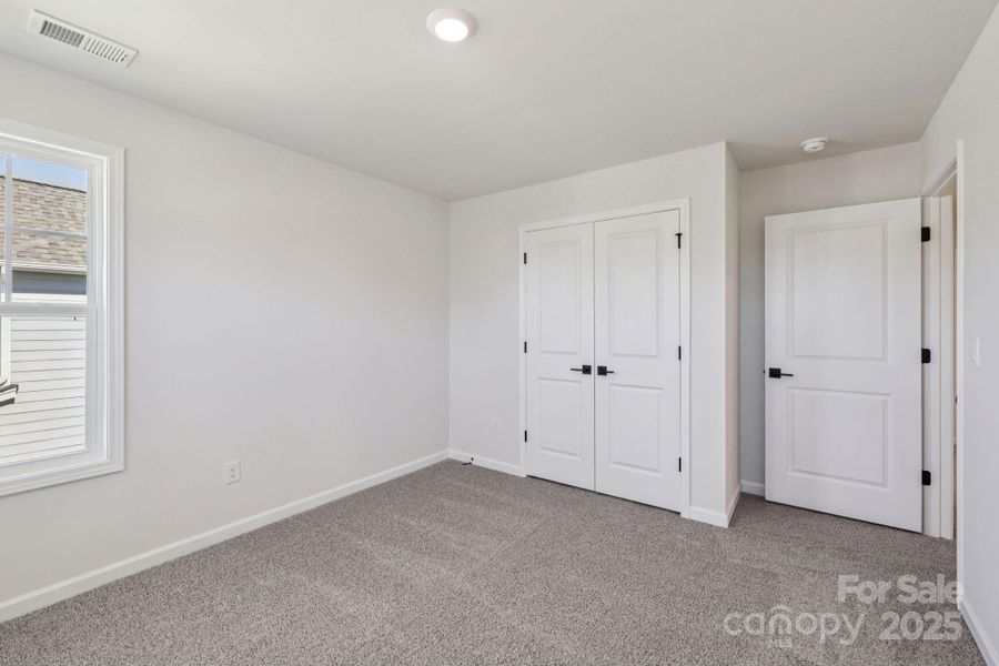 Spacious, unfurnished interior of a new home in Falls Cove, Troutman (Image 29).