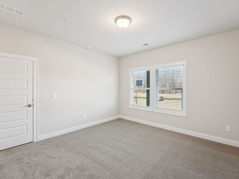 Spacious, unfurnished interior of a new home in Hemingway - Highland Series, Cumming (Image 14).