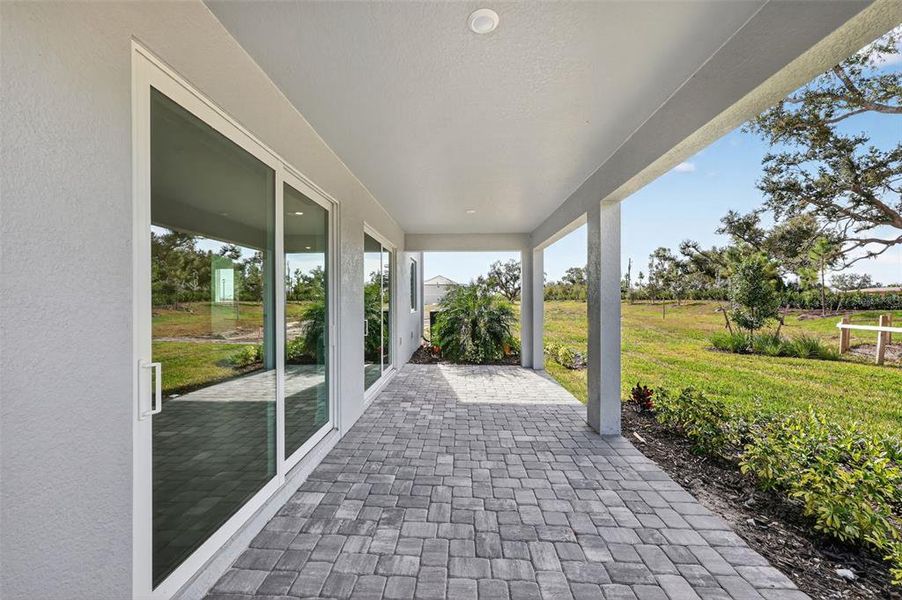 Exterior details and patio area of a home in Hawkstone, Sarasota (Image 24).